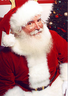 An image of Santa Claus, looking Into the camera