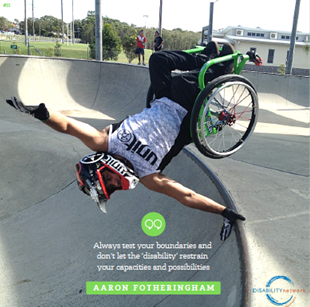 An image of a wheelchair user in a skate park. The wheelchair user is inverted and performing a hand plant trick on the ramp coping.